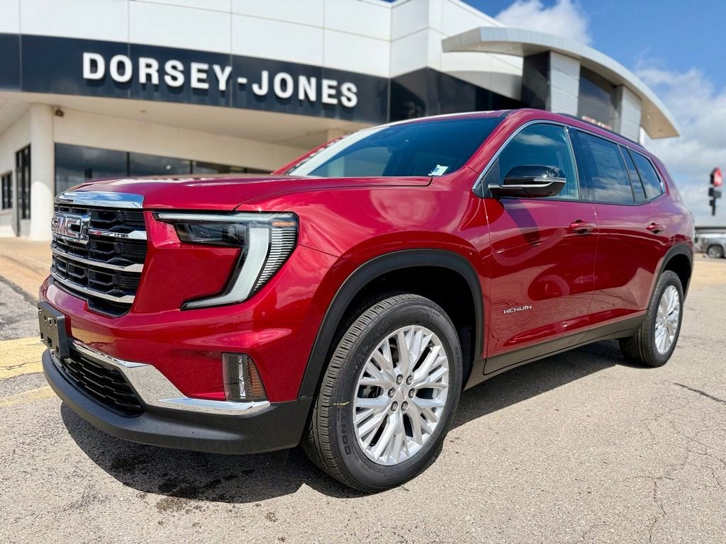 2026 GMC Acadia Elevation in Volcanic Red Tintcoat — front three-quarter view