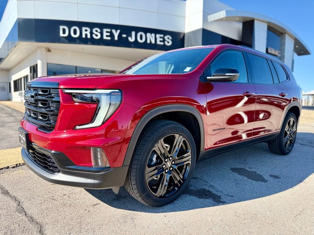 2026 GMC Acadia Elevation in Volcanic Red Tintcoat — front three-quarter view