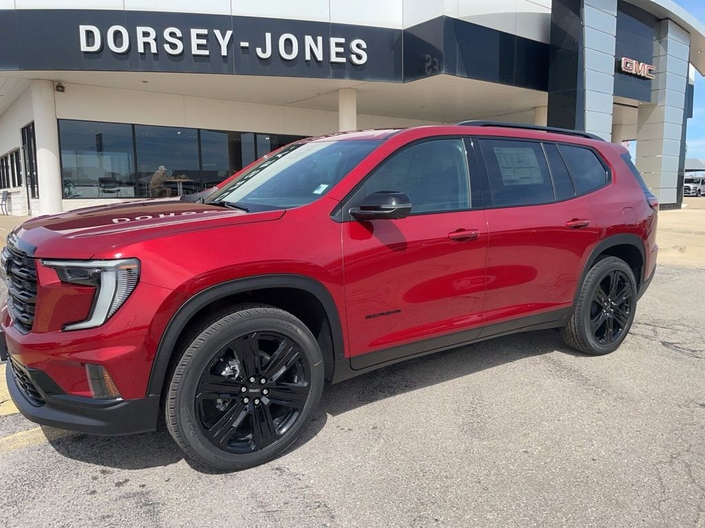 2026 GMC Acadia Elevation in Volcanic Red Tintcoat — front three-quarter view