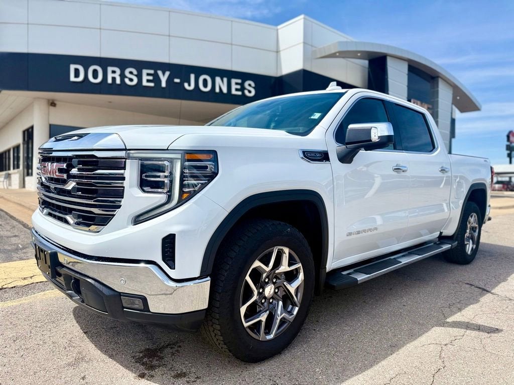 2026 GMC Sierra 1500 SLT in Summit White — front three-quarter view