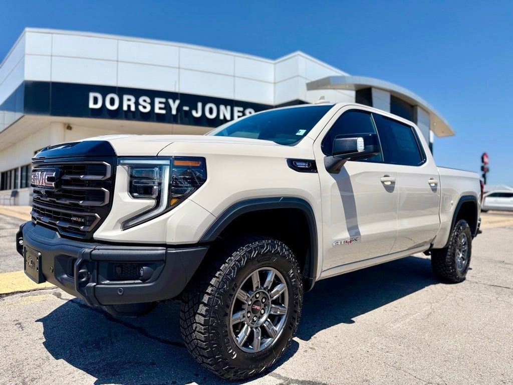 2026 GMC Sierra 1500 AT4X in Coastal Dune — front three-quarter view